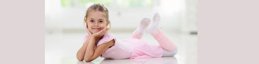 Little girl wearing ballet outfit