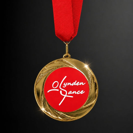Gold medal with a red ribbon featuring 'Lynden Dance' on a black background
